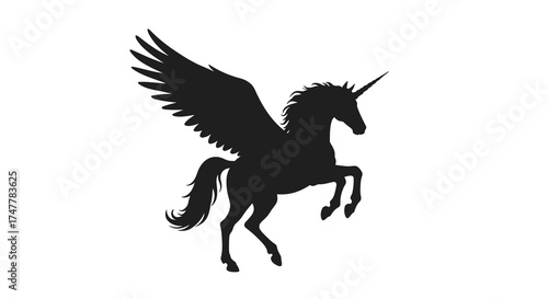 Majestic silhouette of a black winged unicorn rearing up against a silhouette