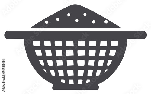 Dark gray icon of a colander filled with sand and small pebbles