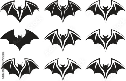 Collection of Stylized Black Bat Silhouettes on White Background flying wing