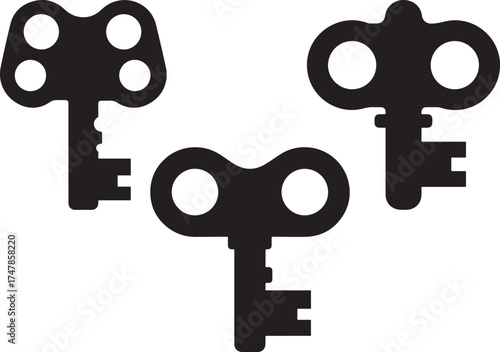 Three antique wind up toy keys in silhouette isolated on white background
