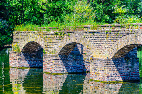 Old stone bridge with arches 