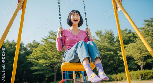 Joyful Woman on Swing Happiness and Leisure in the Park