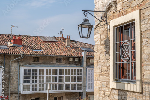 Traditional Stone and White Glass Balcony Architecture Detail in Vitoria Gasteiz Old Town, Rustic, Historic Basque City Center
