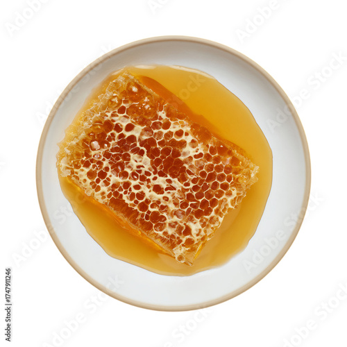 Honeycomb in golden syrup isolated on transparent background