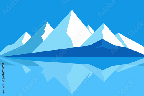 Mountains reflecting in water in a blue landscape