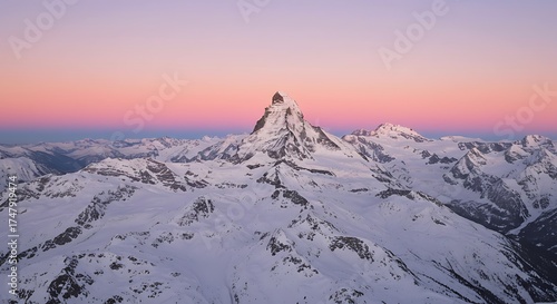 Majestic Snow-Capped Mountain Peak at Sunrise with Gradient Sky