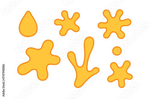 Set of abstract yellow and orange liquid shapes including paint splatters and a single drop