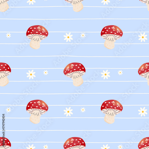 Vector seamless pattern with red fly agaric mushrooms and flowers. Cute design, perfect for autumn, children textiles, gift wrapping, and cozy seasonal illustrations