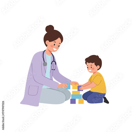 a pediatrician sitting on the floor playing blocks with a little boy, doctor wearing a lilac lab coat and light gray pants, both smiling.
