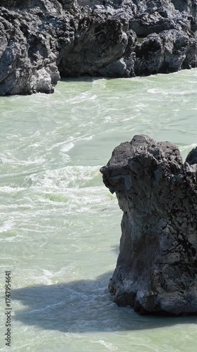 Slow motion vertical video of Altai river Katun and rapids Oroktoy Teldekpen near Oroktoysky bridge.