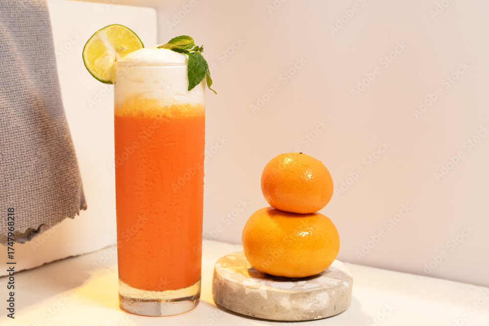 Fototapeta premium Orange Juice Float with Milk Creamy Topping