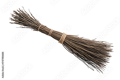 Rustic broom with bundled straw, secured with twine, a simple tool for cleaning.