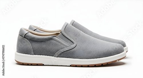 Pair of modern gray casual slip-on loafers shoes isolated on white background for e-commerce product display
