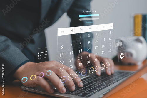 Businessman using laptop with virtual calendar and AI assistant interface, concept of digital scheduling, time management, productivity planning, and smart technology for business organization.