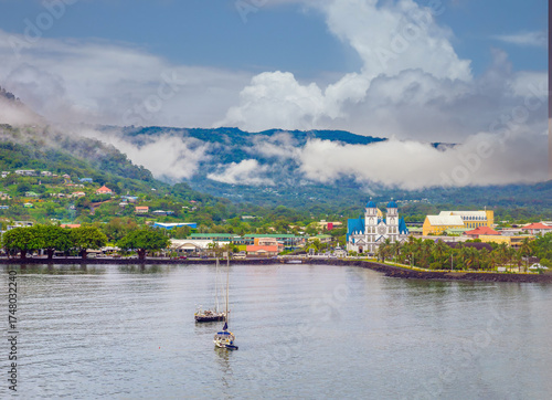 View of the water front of the capital city Apia, Samoa, with the cathedral of the Immaculate Conception prominent in the skyline