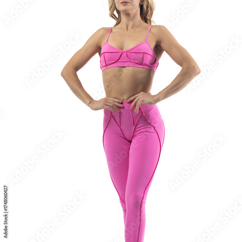 Athletic woman posing in pink sports bra and leggings with transparent background