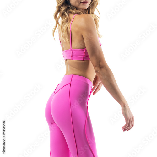 Athletic woman posing in pink sports bra and leggings with transparent background