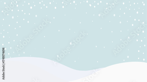 Minimal winter falling snow and snow drifts against a light blue background, creating a serene holiday scene