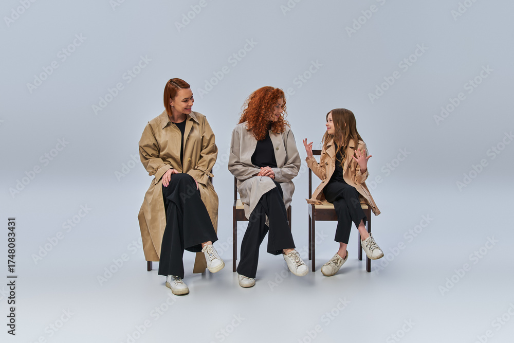 Naklejka premium Three generations of joy in autumn outfits celebrating family togetherness