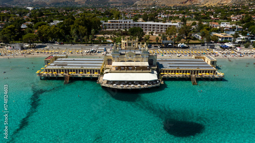 Aerial view of the Charleston on Mondello Beach, located near Palermo, Sicily, Italy. This Art Nouveau beach resort overlooks the turquoise waters of the Tyrrhenian Sea. A beautiful beach club.