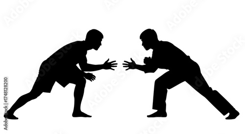 Dynamic Silhouette of Two Martial Artists in Ready Stance, Facing Each Other for Training or Combat