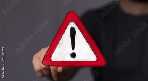Urgent alert concept.  Hand...