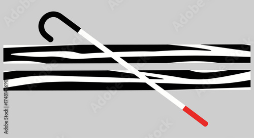 Graphic illustration of a white cane for the blind resting on a zebra crossing.
