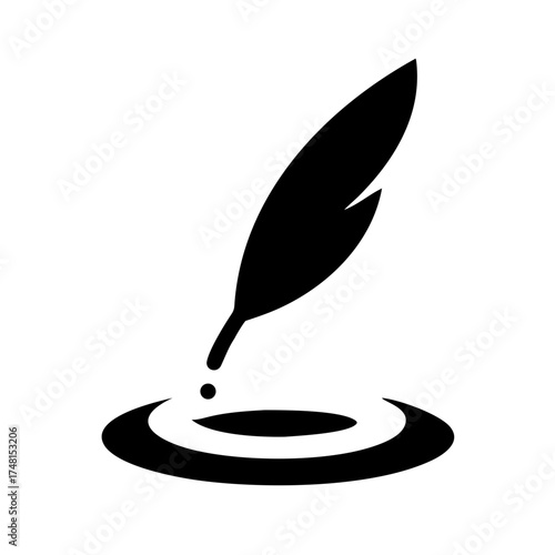 Feather quill in inkwell