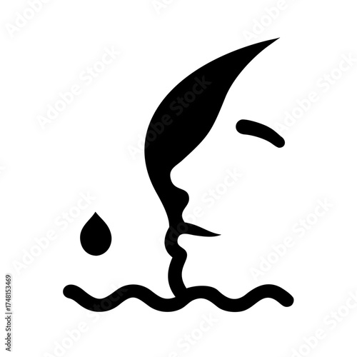 Silhouette of a face with a tear drop