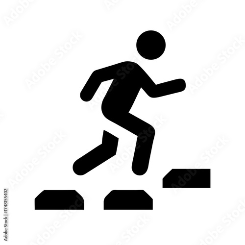 Silhouette of a person climbing stairs