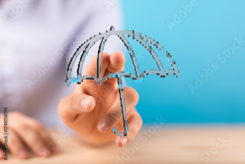 A hand holding a digital um...