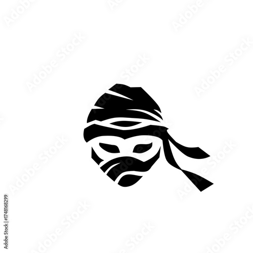 Black icon of a stylized head completely wrapped in fabric, resembling a ninja or masked warrior. Represents stealth, secrecy, mystery, and covert operations.