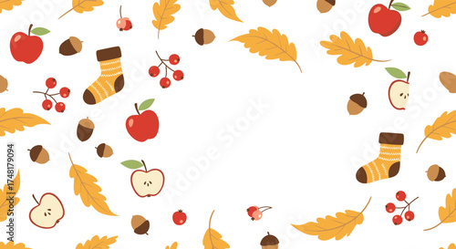 A delightful collection of autumnal elements including acorns apples socks and leaves.