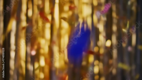 Golden, blurred balloons and confetti