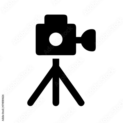 Video camera on tripod, ready for filming action