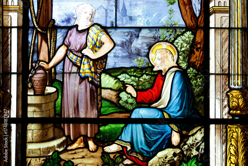 Saint Louis church.  Stained glass. Jesus and the samaritan woman at jacob's well. La Roche sur Yon. France.