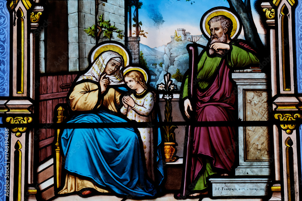 Fototapeta premium Saint Seine church. Stained glass. Saint Anne teaching the young Virgin how to pray. Corbigny. France.