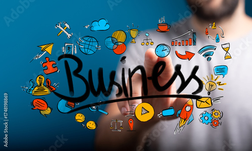 Hand pointing at Business w...