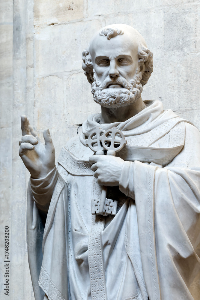 Obraz premium Bayeux cathedral. Statue of Saint Peter holding the keys, symbolizing the keys to Heaven and his role as the gatekeeper of the Church. Bayeux. France. Bayeux. France.