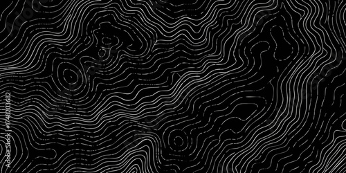 Abstract topographic map lines on a black background creating a textured surface pattern
