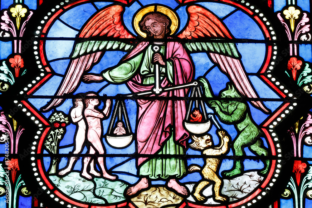 Fototapeta premium Bayeux cathedral. Stained glass. Saint Michael. The Last Judgment. The Weighing of Souls. Bayeux. France.