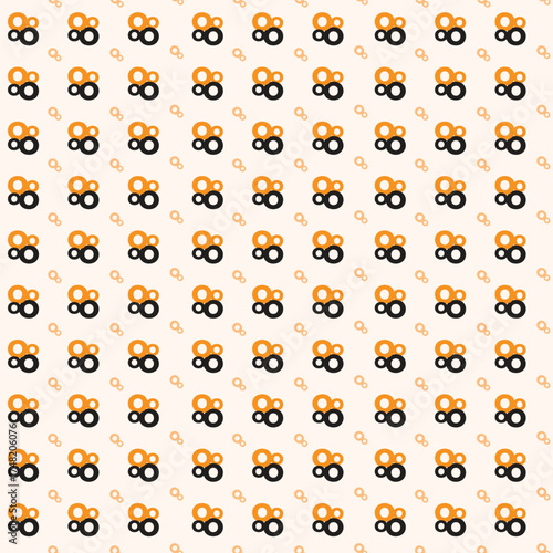 Seamless pattern of orange and black circles on beige