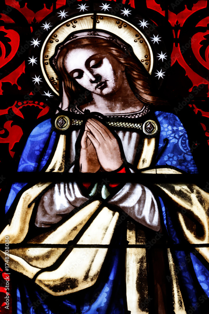 Fototapeta premium Church of the Cordeliers. Stained glass. Crowned Virgin Mary. Lons le Saunier. France.