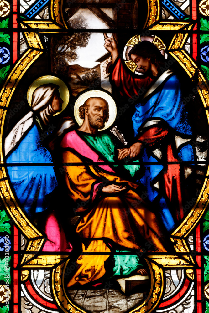Obraz premium Church of the Cordeliers. Stained glass. The death of Saint Joseph surrounded by the Blessed Virgin and Jesus. Lons le Saunier. France.