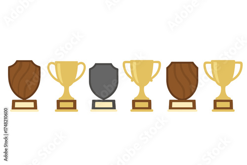 Collection of various golden award trophies and shield plaques for success and victory