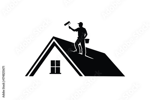 Silhouette of a painter on a house roof with a paint roller and bucket