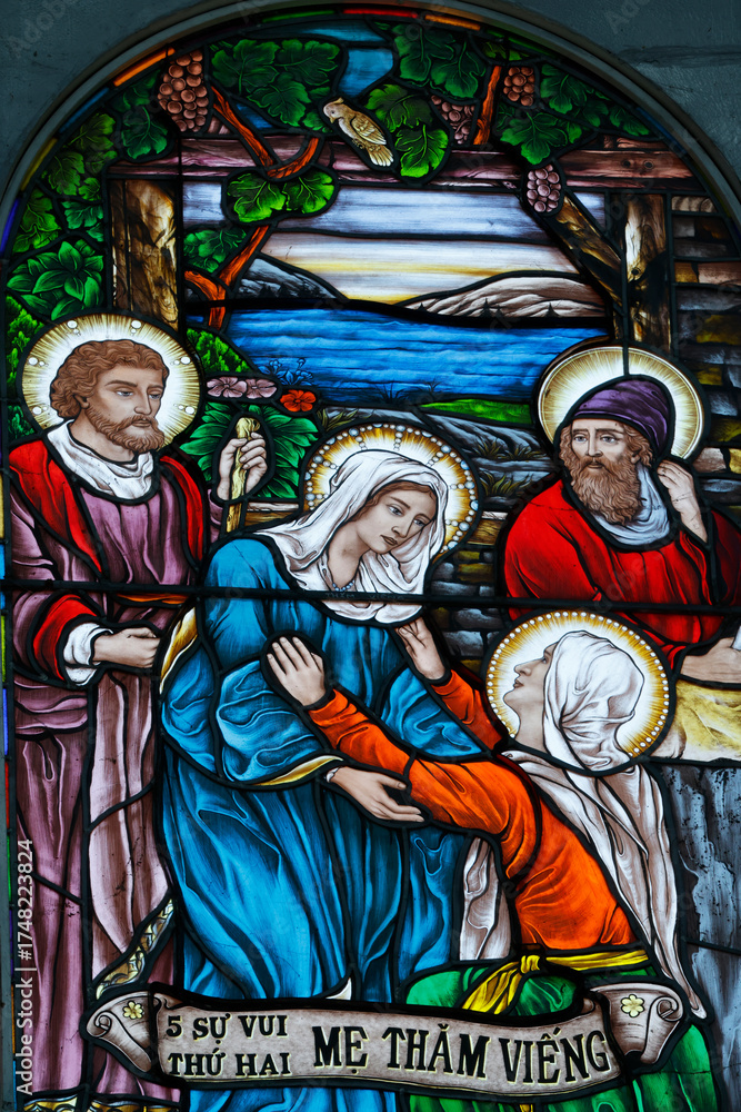 Obraz premium Stained glass. The Visitation is the visit of Mary, who was pregnant with Jesus, to Elizabeth, who was pregnant with John the Baptist Church of Fatima. Ho Chi Minh city. Vietnam.