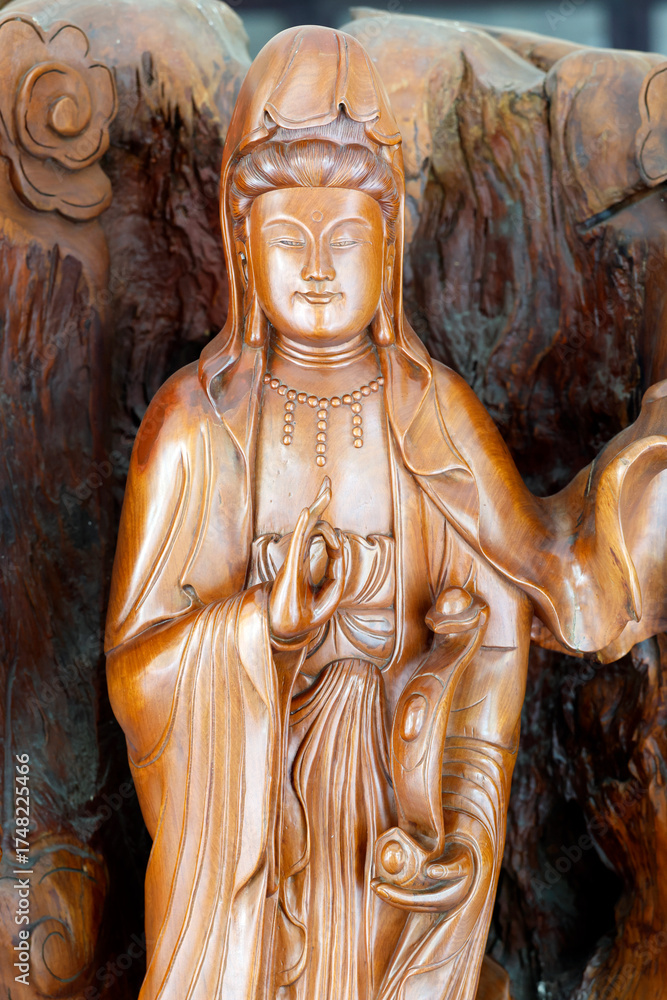 Obraz premium Vinh Nghiem Buddhist Pagoda. Guan Yin, Guanyin, Quan Am, name for Avalokiteshvara, the bodhisattva of compassion which is usually represented as a female figure. Ho Chi Minh city. Vietnam.