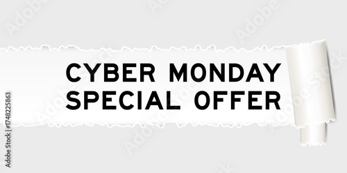Ripped gray paper background that have word cyber monday special offer under torn part
