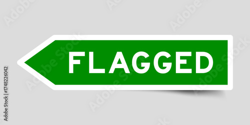Green color arrow shape sticker label with word flagged on gray background